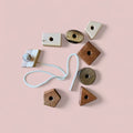 Wooden lacing toy