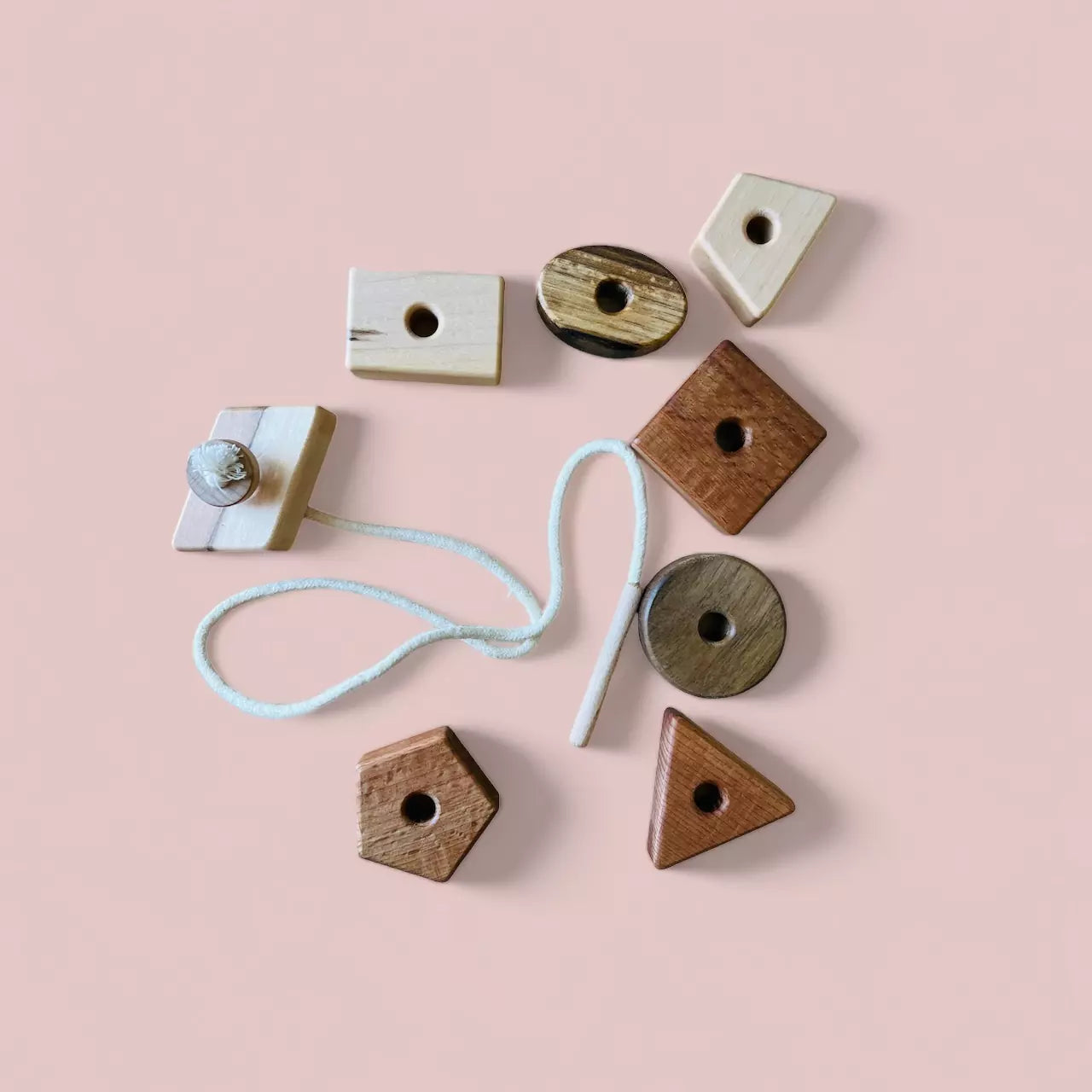 Wooden lacing toy